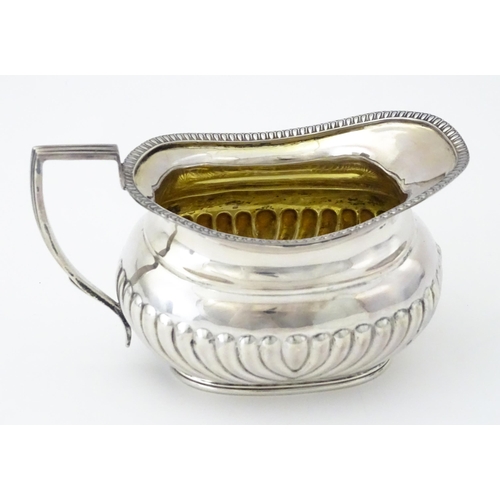 333 - A Victorian silver cream jug hallmarked Sheffield 1898, maker Joseph Rogers & Sons. Approx. 5 1/2