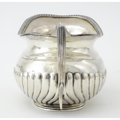 333 - A Victorian silver cream jug hallmarked Sheffield 1898, maker Joseph Rogers & Sons. Approx. 5 1/2