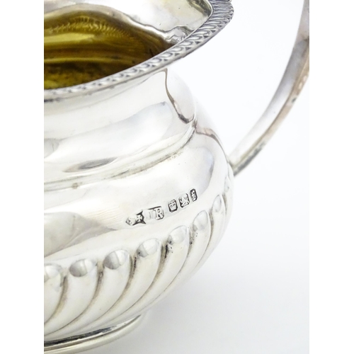 333 - A Victorian silver cream jug hallmarked Sheffield 1898, maker Joseph Rogers & Sons. Approx. 5 1/2