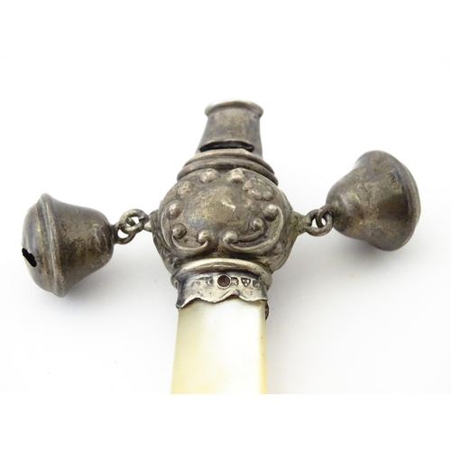 335 - A silver child's rattle with mother of pearl teether handle and whistle to one end, hallmarked Chest... 