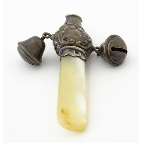 335 - A silver child's rattle with mother of pearl teether handle and whistle to one end, hallmarked Chest... 