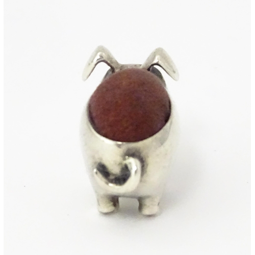 336 - A .925 sterling silver novelty pin cushion formed as a pig. Approx. 1