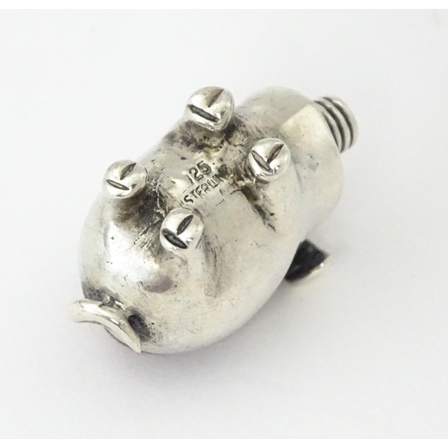 336 - A .925 sterling silver novelty pin cushion formed as a pig. Approx. 1