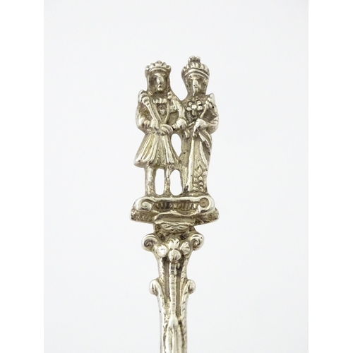 337 - A Dutch Export silver spoon surmounted by a figures. Approx. 7