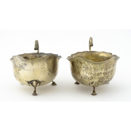 338 - A pair of silver sauce boats hallmarked Birmingham 1909, maker E S Barnsley & Co. Approx. 5 3/4