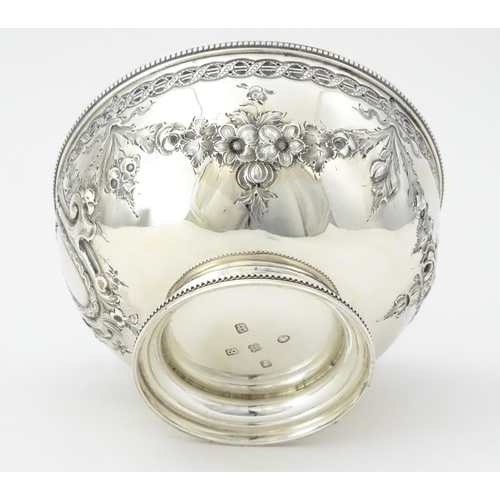 339 - A Victorian silver bowl with floral swag detail hallmarked Sheffield 1869, maker Martin Hall & Co. A... 