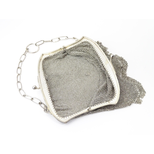 341 - A silver bag / purse of chain mesh form, bearing import marks for Chester 1915, imported Jose Herman... 