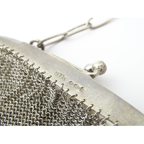 341 - A silver bag / purse of chain mesh form, bearing import marks for Chester 1915, imported Jose Herman... 