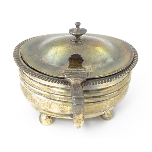 348 - A George III silver mustard pot with blue glass liner hallmarked London 1814, maker Jeremiah Garfiel... 