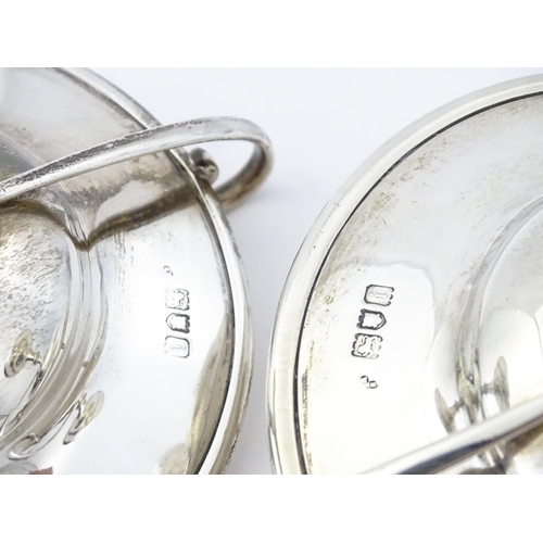 349 - A pair of silver twin handled pedestal bon bon dishes of tazza form, hallmarked London 1904, maker H... 