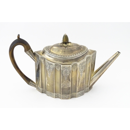 351 - A George III silver teapot with engraved decoration, hallmarked London 1791, maker Peter & Ann Batem... 