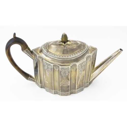 351 - A George III silver teapot with engraved decoration, hallmarked London 1791, maker Peter & Ann Batem... 