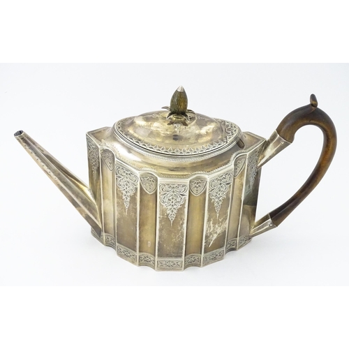 351 - A George III silver teapot with engraved decoration, hallmarked London 1791, maker Peter & Ann Batem... 