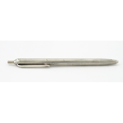 354 - A .925 silver pen with engine turned decoration. Approx. 4 3/4