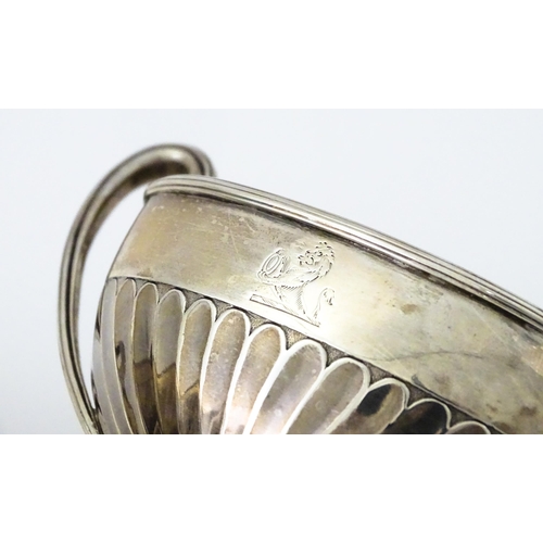 361 - A pair of George III silver twin handled salts with gilded interiors, hallmarked London 1784, maker ... 