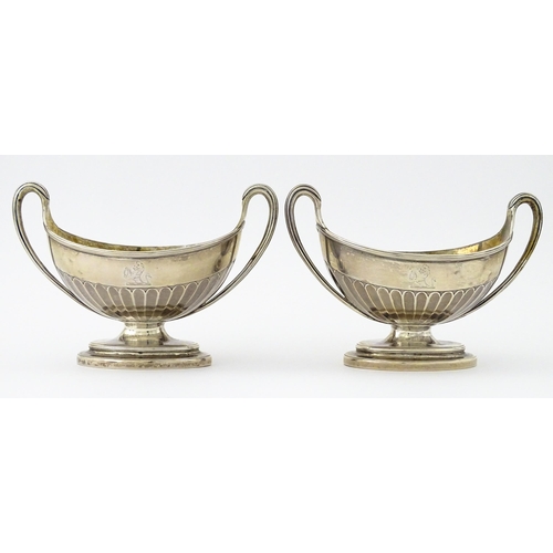 361 - A pair of George III silver twin handled salts with gilded interiors, hallmarked London 1784, maker ... 