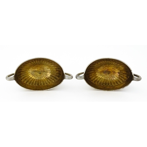 361 - A pair of George III silver twin handled salts with gilded interiors, hallmarked London 1784, maker ... 