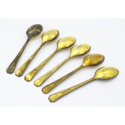 362 - A set of six commemorative / souvenir silver gilt teaspoons depicting various members of the Royal F... 