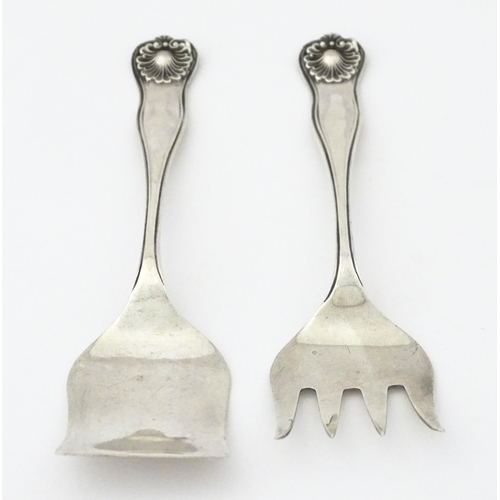 363 - A pair of silver sardine servers, hallmarked Sheffield 1909, maker James Deakin & Sons. Approx. 4 1/... 