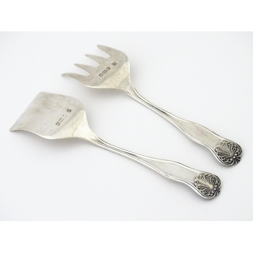 363 - A pair of silver sardine servers, hallmarked Sheffield 1909, maker James Deakin & Sons. Approx. 4 1/... 