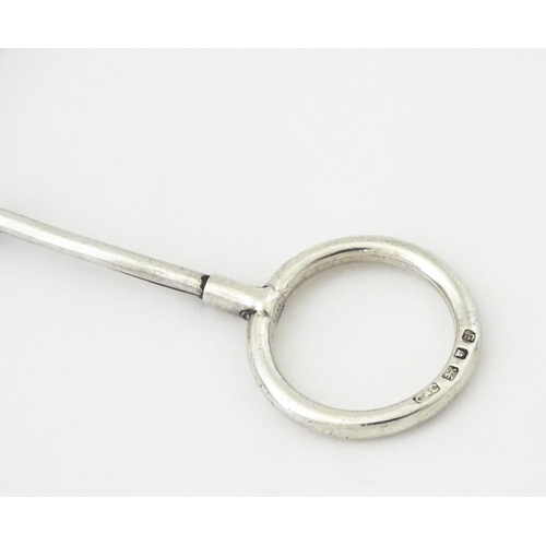 366 - A silver cigarette holder with ring to one end, hallmarked London 1937, maker Cohen & Charles. Appro... 