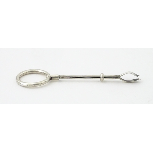 366 - A silver cigarette holder with ring to one end, hallmarked London 1937, maker Cohen & Charles. Appro... 