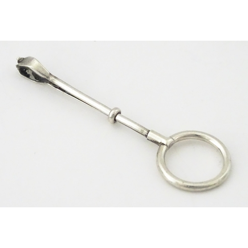 366 - A silver cigarette holder with ring to one end, hallmarked London 1937, maker Cohen & Charles. Appro... 