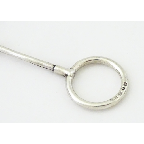 366 - A silver cigarette holder with ring to one end, hallmarked London 1937, maker Cohen & Charles. Appro... 