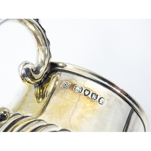 381 - A Victorian silver mug / tankard with banded detail hallmarked London 1885, maker William Hutton & S... 