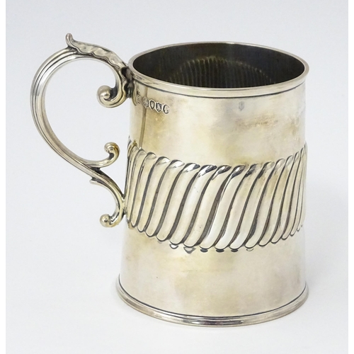 381 - A Victorian silver mug / tankard with banded detail hallmarked London 1885, maker William Hutton & S... 