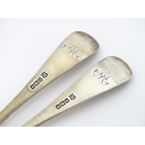 384 - A pair of George V silver Hanoverian pattern tablespoons with rat tail detail, hallmarked Sheffield ... 