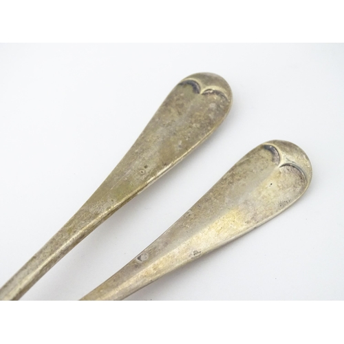 384 - A pair of George V silver Hanoverian pattern tablespoons with rat tail detail, hallmarked Sheffield ... 