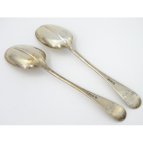 384 - A pair of George V silver Hanoverian pattern tablespoons with rat tail detail, hallmarked Sheffield ... 