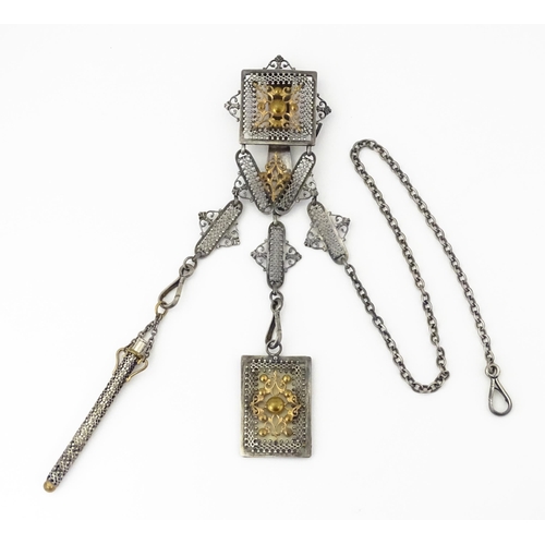 386 - A late 19th / early 20thC silver plate chatelaine with gilt metal highlights, having three hanging c... 