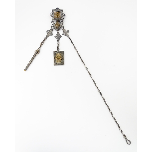 386 - A late 19th / early 20thC silver plate chatelaine with gilt metal highlights, having three hanging c... 