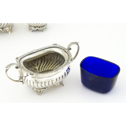 387 - A matched silver three piece cruet comprising salt, pepper and mustard, hallmarked London 1913 / 191... 