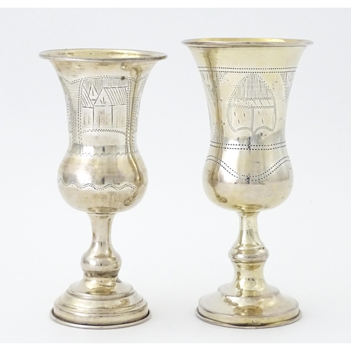 392 - Two silver kiddush cups hallmarked London 1900 / 1905, maker Rubin Koshr / Kusher. Largest approx. 5... 