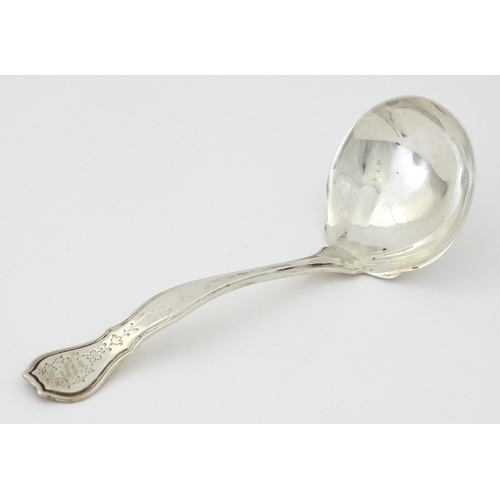 394 - An American sterling silver sauce ladle by R. Wallace & Sons. Approx. 6 3/4