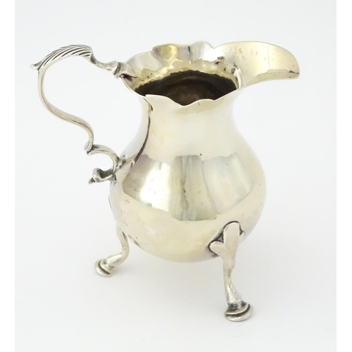 400 - A George III silver cream jug hallmarked London 1763, maker SM. Approx. 3 3/4