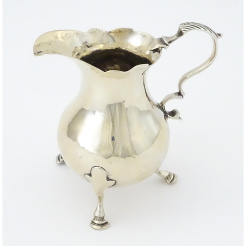 400 - A George III silver cream jug hallmarked London 1763, maker SM. Approx. 3 3/4