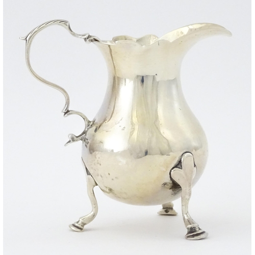 400 - A George III silver cream jug hallmarked London 1763, maker SM. Approx. 3 3/4