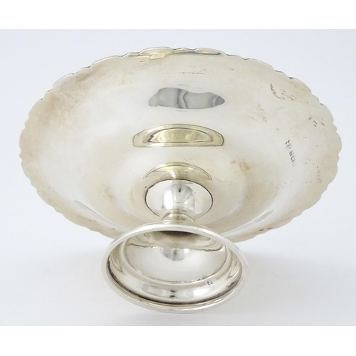 403 - A small silver pedestal tazza hallmarked Birmingham 1927, maker Mappin & Webb. Approx. 2 1/2