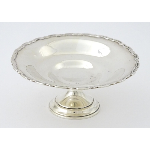 403 - A small silver pedestal tazza hallmarked Birmingham 1927, maker Mappin & Webb. Approx. 2 1/2