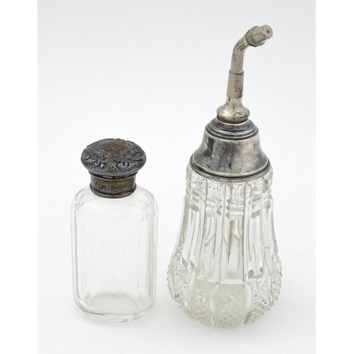 405 - A cut glass atomiser with sterling silver mount, maker William Henry Sparrow. 
Together with a glass... 