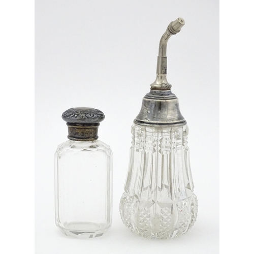 405 - A cut glass atomiser with sterling silver mount, maker William Henry Sparrow. 
Together with a glass... 