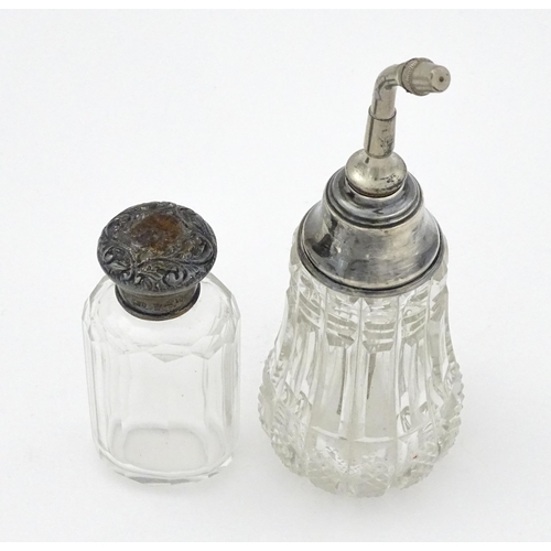 405 - A cut glass atomiser with sterling silver mount, maker William Henry Sparrow. 
Together with a glass... 