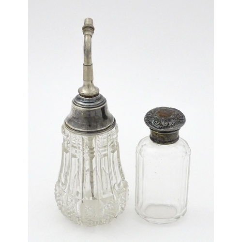 405 - A cut glass atomiser with sterling silver mount, maker William Henry Sparrow. 
Together with a glass... 