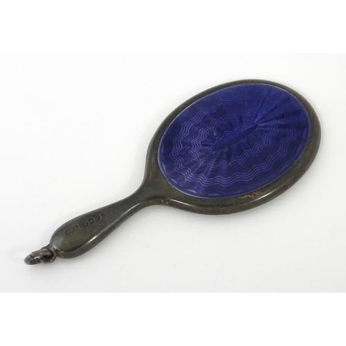 408 - A silver miniature hand mirror with purple guilloche enamel decoration hallmarked Birmingham 1921, m... 