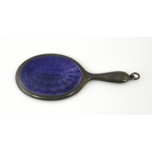 408 - A silver miniature hand mirror with purple guilloche enamel decoration hallmarked Birmingham 1921, m... 