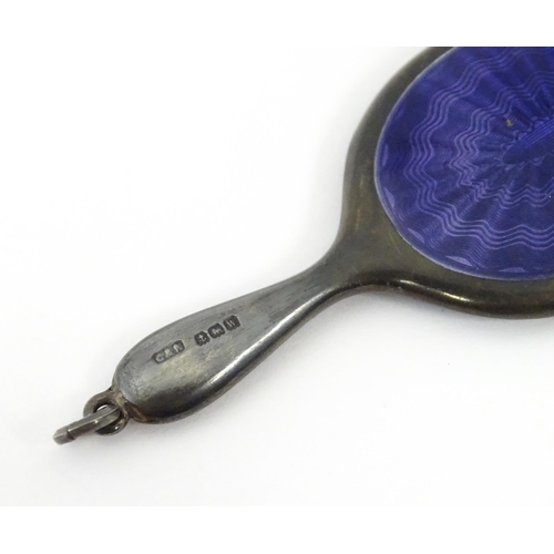 408 - A silver miniature hand mirror with purple guilloche enamel decoration hallmarked Birmingham 1921, m... 